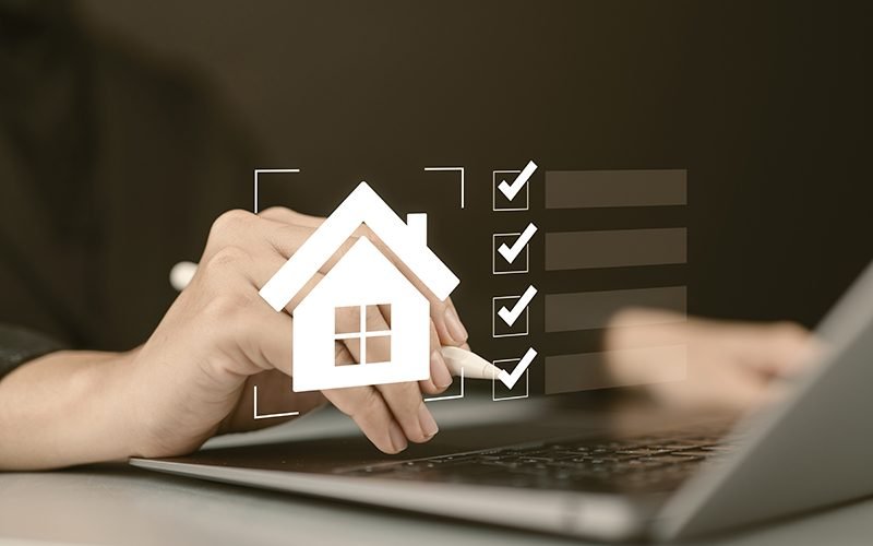 Real estate checklist concept, A woman professional organizing real estate tasks on a laptop using a digital checklist, streamlining property management and housing investments with innovative tools.