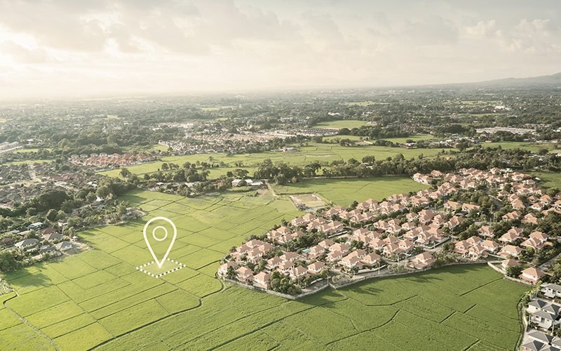 Land plot in aerial view. Identify registration symbol of vacant